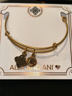 Alex and Ani Gold Tone Celtic Knot Bangle with Amber Crystal